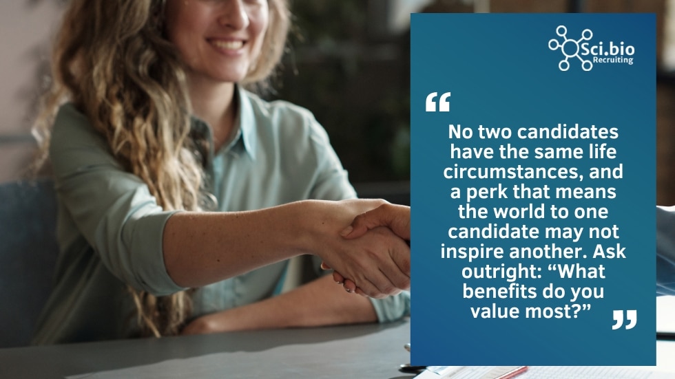 smiling person shaking hands across table with offer they can't refuse